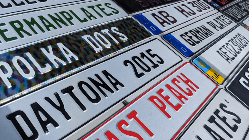 Custom European license plates on display at the car events